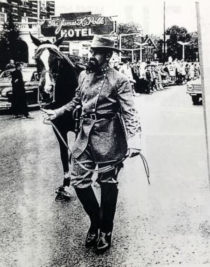 The MTSU Nathan Bedford Forrest mascot marches in the 1961 homecoming parade.