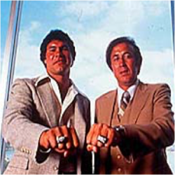 The Latino duo, Jim Plunkett (left) and Tom Flores led the Oakland Raiders to two SB victories.  Photo Credit: http://www.raiders.com/history/timeline.html 